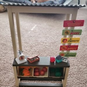 American girl doll produce stand